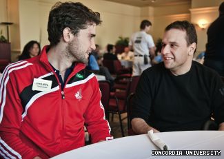 Olympic athlete and JMSB student Philippe Beaudry talks with Distribution Services Mike Russo.